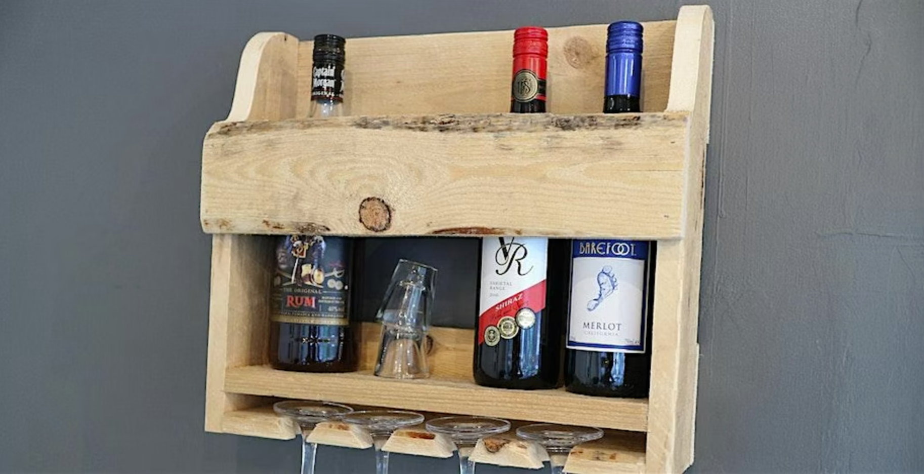 a picture of a wine rack mounted on a wall with wine bottles and glass in ut